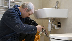 Plumber fitting new bathroom